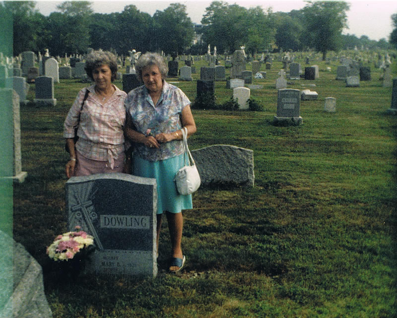 Dowling
Kathleen Dowling Beck and her sister Mary (Peggy) Dowling Taylor at the grave of their parents.
Photo from Mary Lowrey
