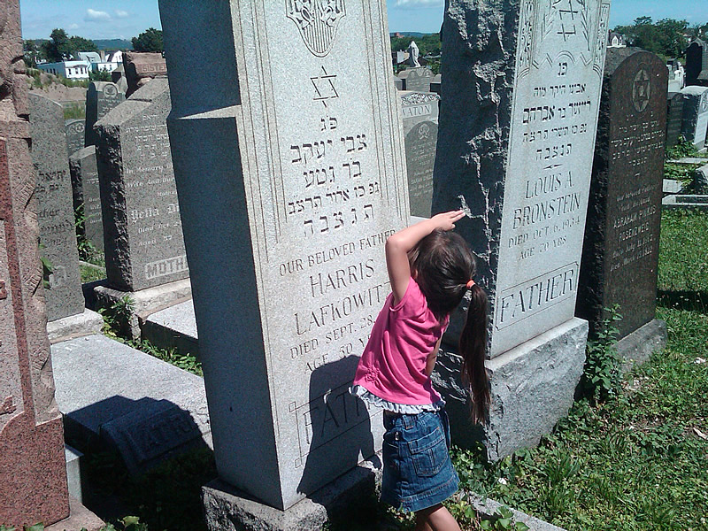 Alexa viewing the headstone
Nancy Hartmann

