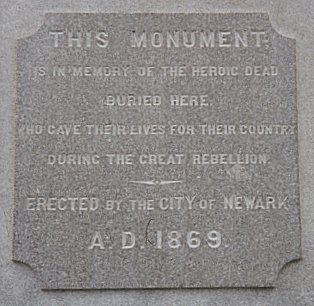 Monument Plaque
"This monument is in memory of the heroic dead buried here, who gave their lives for their country during the great rebellion.
Erected by the City of Newark A. D. 1869"
