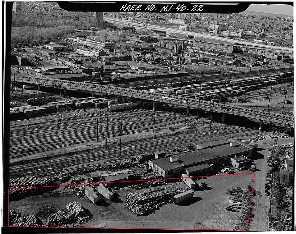 The area on the bottom in red is part of Potter's Cemetery.  As you can see it was taken over by a company and used as a garbage dump.
Photo from the Library of Congress
